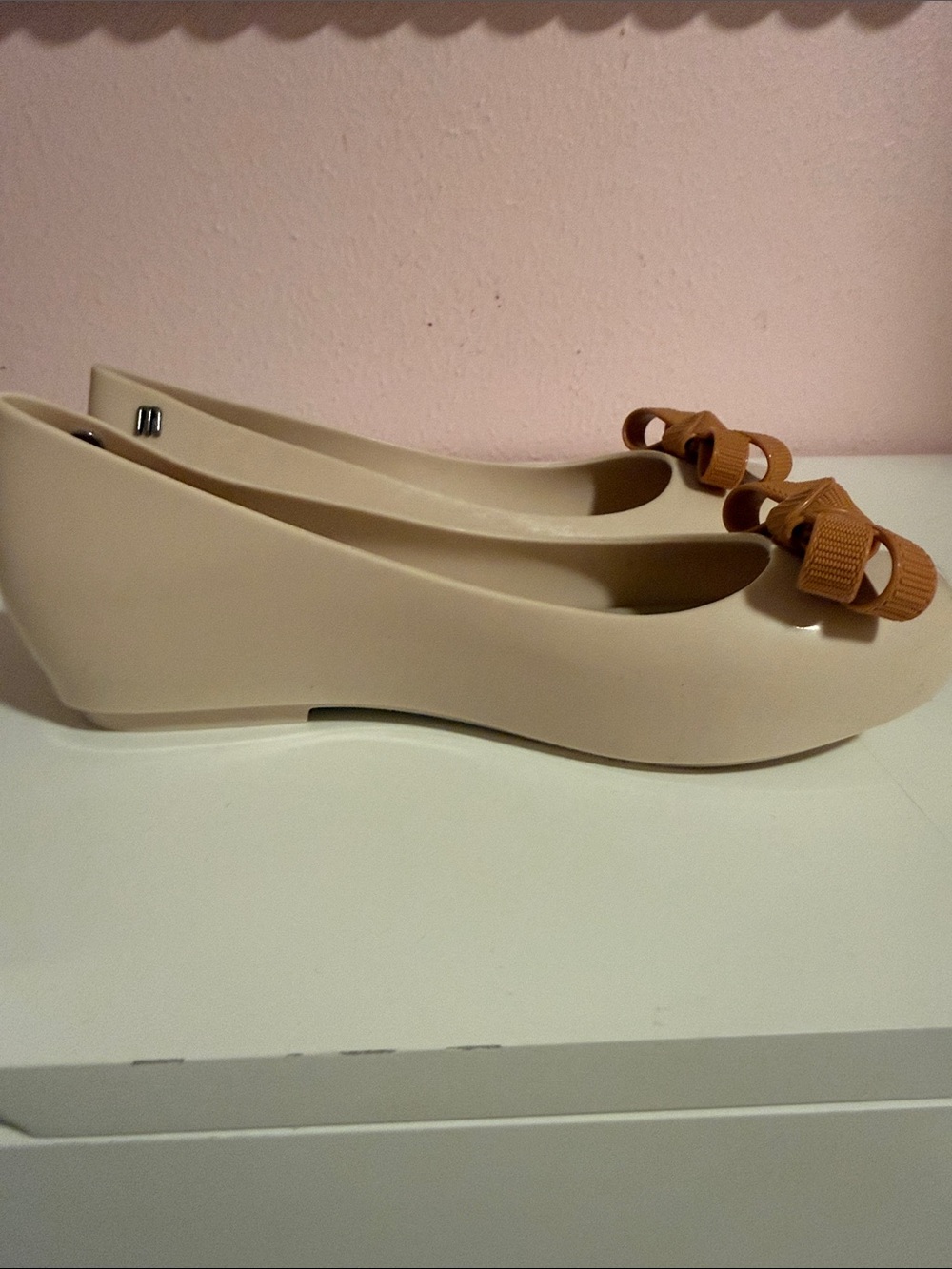 Mini Melissa Beige Wedge Flats with Tan Bow Accent